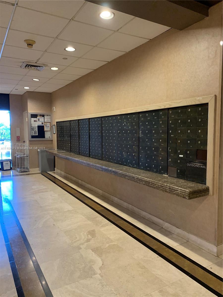 1800 Northeast 114th Street, Unit 703 Miami, FL 33181 - Photo 31 of 33 a view of a living room with a large window