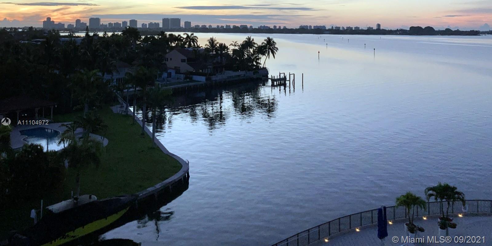 1800 Northeast 114th Street, Unit 703 Miami, FL 33181 - Photo 6 of 33 a view of a lake from a balcony