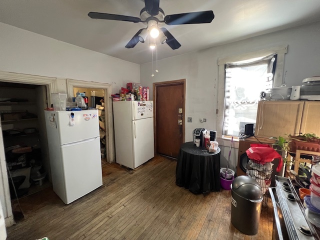 2963 South Archer Avenue Chicago, IL 60608 - Photo 14 of 28 a kitchen with a refrigerator and workspace