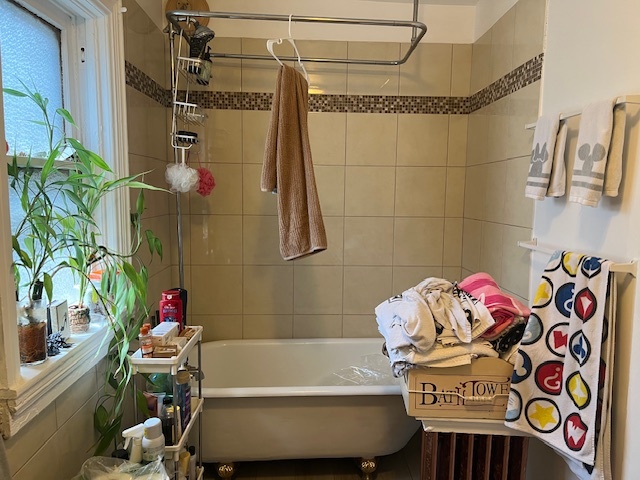 2963 South Archer Avenue Chicago, IL 60608 - Photo 15 of 28 a bathroom with a bathtub and a shower