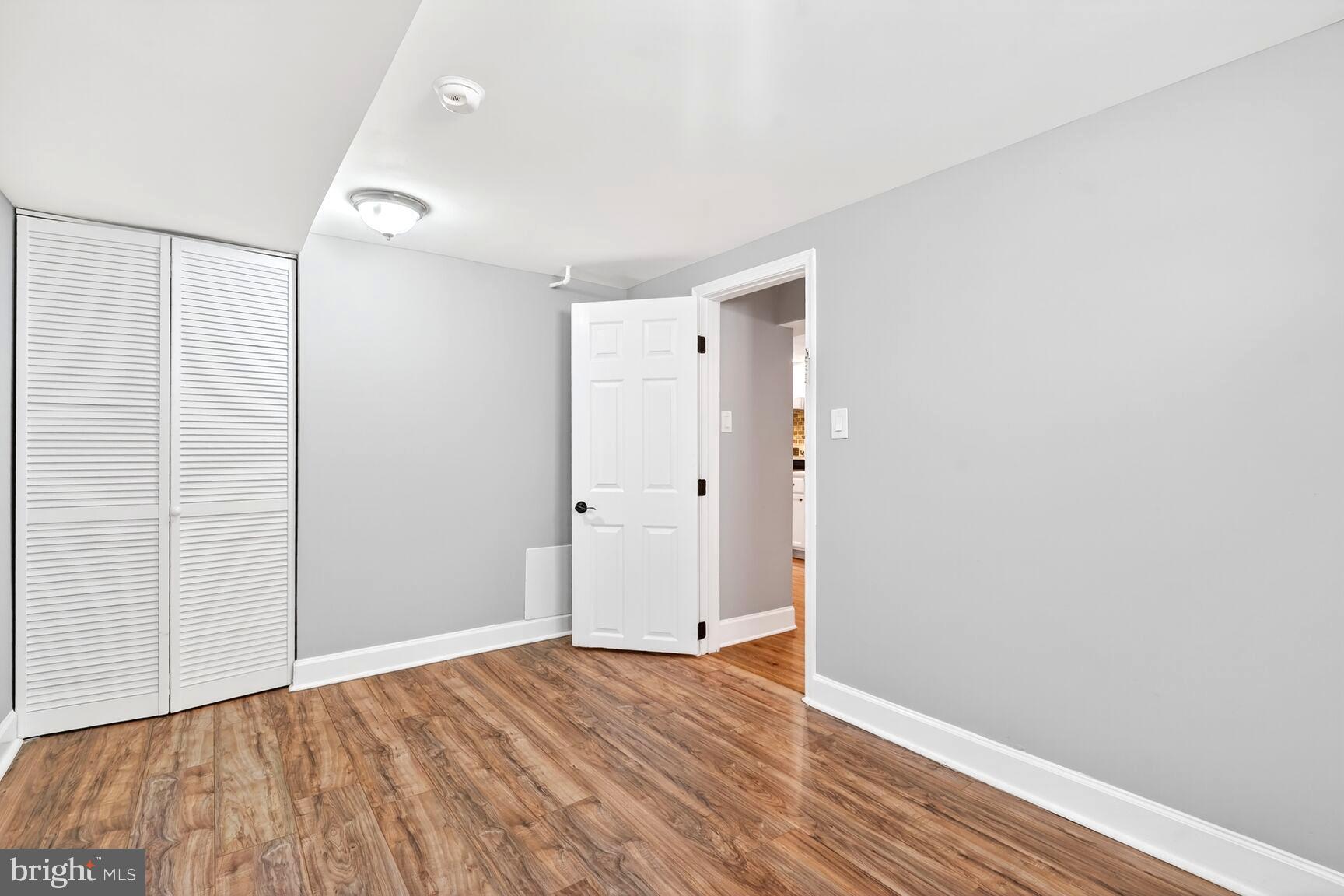 1012 Ward Street Laurel, MD 20707 - Photo 17 of 30 a view of empty room with wooden floor