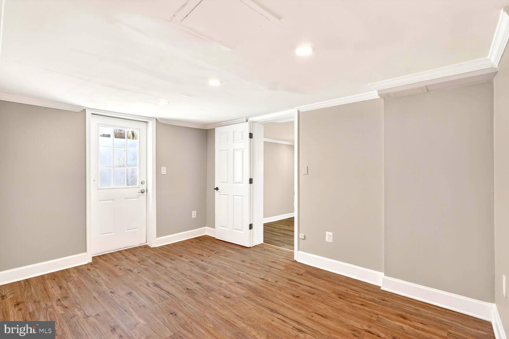 1012 Ward Street Laurel, MD 20707 - Photo 18 of 30 a view of an empty room with wooden floor