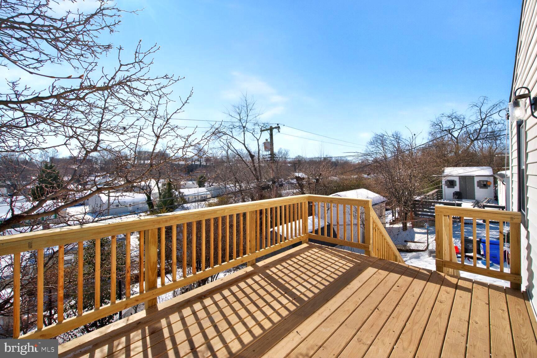 1012 Ward Street Laurel, MD 20707 - Photo 28 of 30 a view of a balcony with wooden floor and fence
