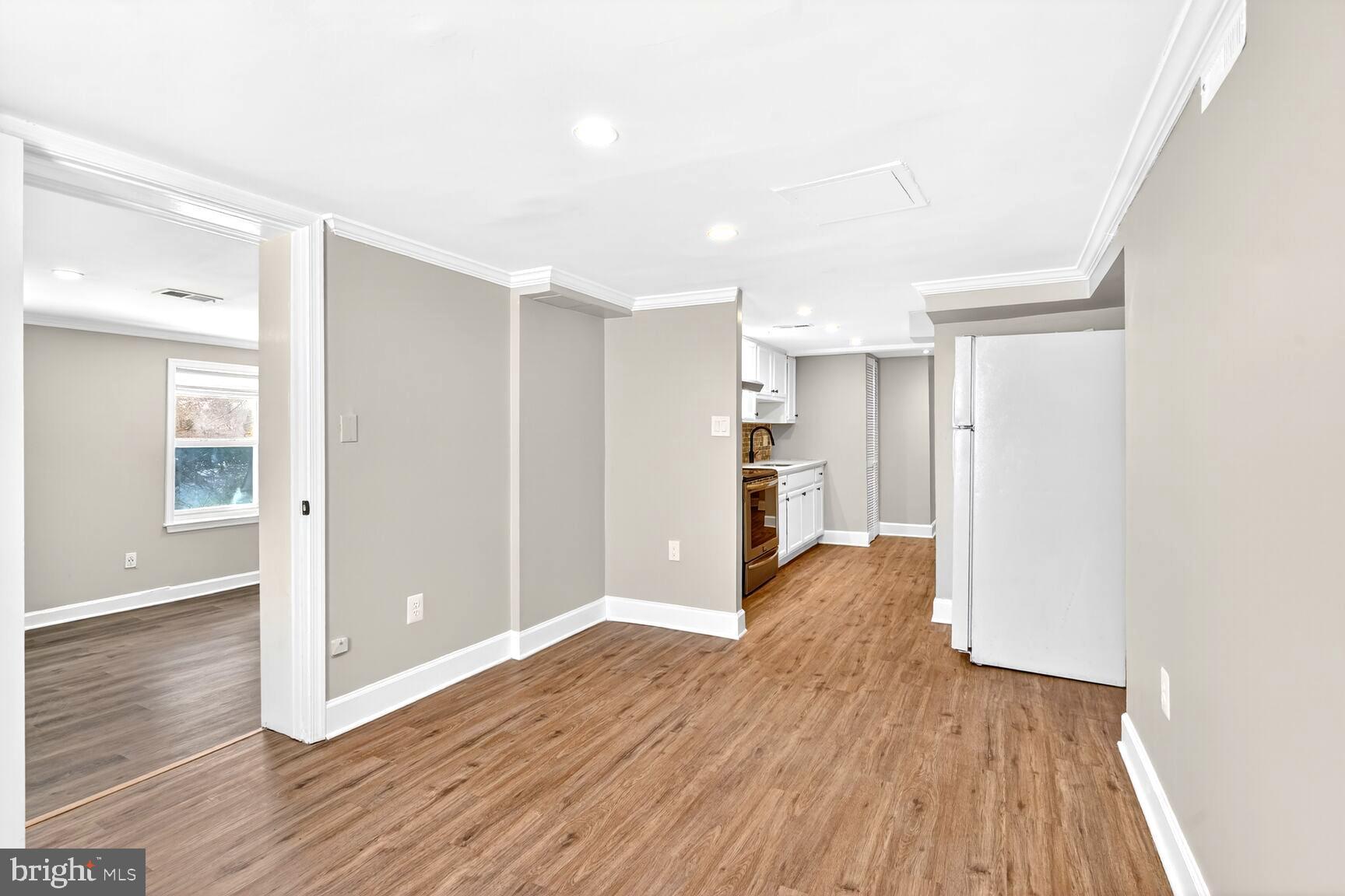 1012 Ward Street Laurel, MD 20707 - Photo 8 of 30 a view of empty room with wooden floor