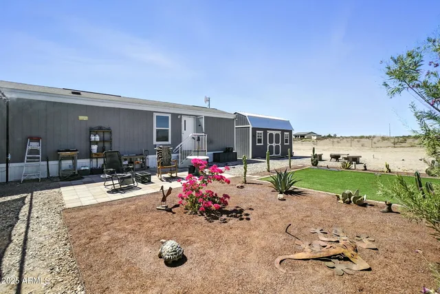 a view of a lounge chairs in the patio