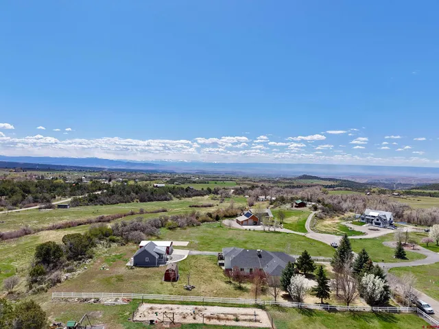 a view of a city with an ocean