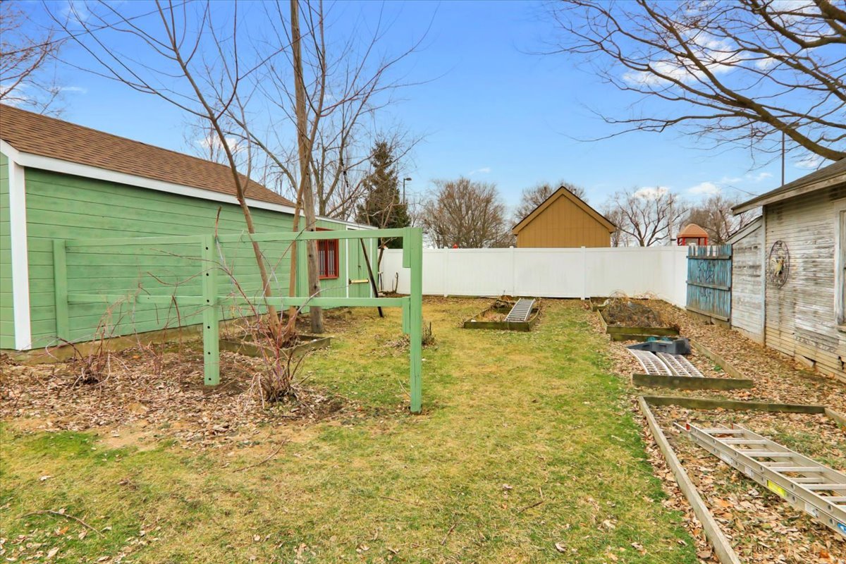 705 Cullom Street Normal, IL 61761 - Photo 14 of 15 a view of a house with a yard