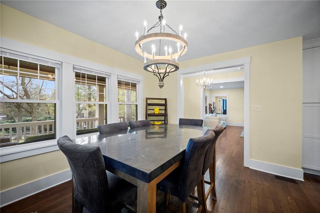 3252 Comanche Road Upper St. Clair, PA 15241 - Photo 11 of 50 a view of a dining room with furniture window and wooden floor