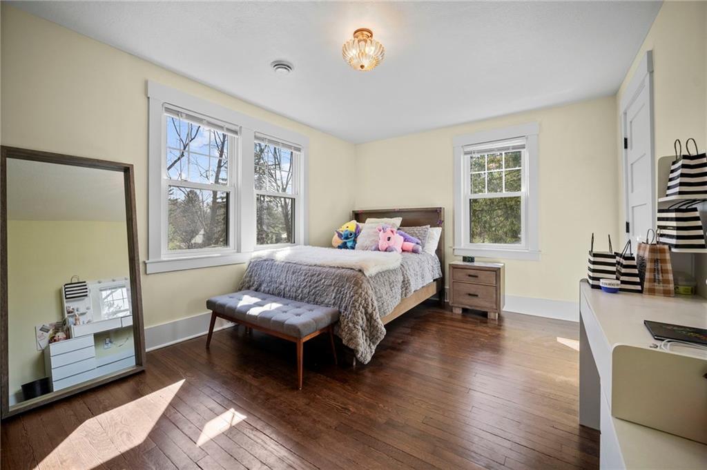 3252 Comanche Road Upper St. Clair, PA 15241 - Photo 25 of 50 a bedroom with a bed and wooden floor