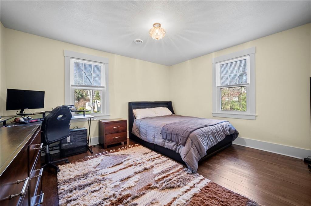 3252 Comanche Road Upper St. Clair, PA 15241 - Photo 30 of 50 a bedroom with a bed and a desk