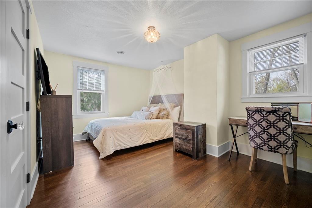 3252 Comanche Road Upper St. Clair, PA 15241 - Photo 31 of 50 a bedroom with a bed and wooden floor