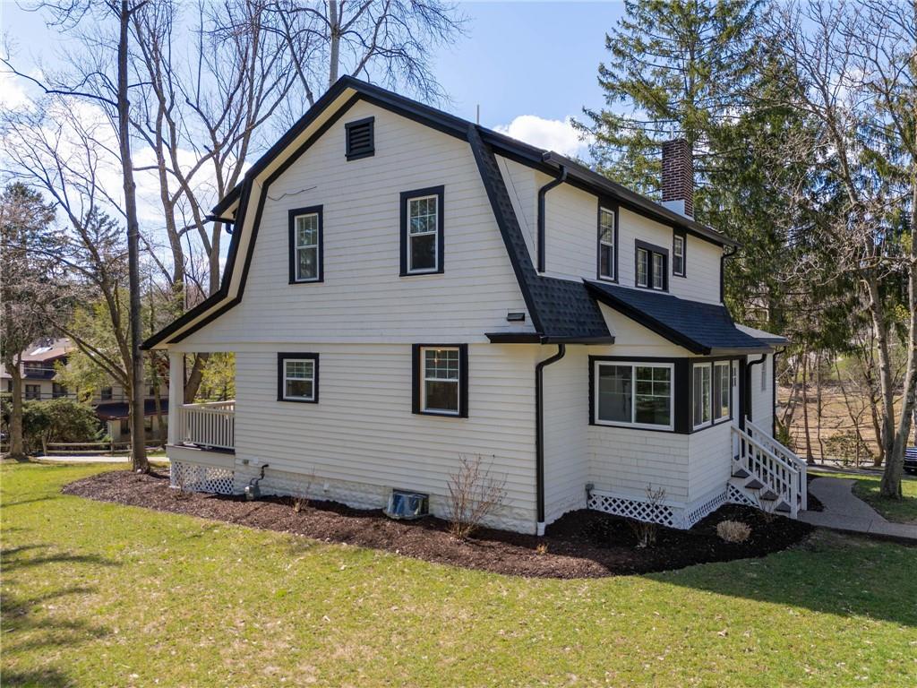 3252 Comanche Road Upper St. Clair, PA 15241 - Photo 43 of 50 a view of a house with a yard