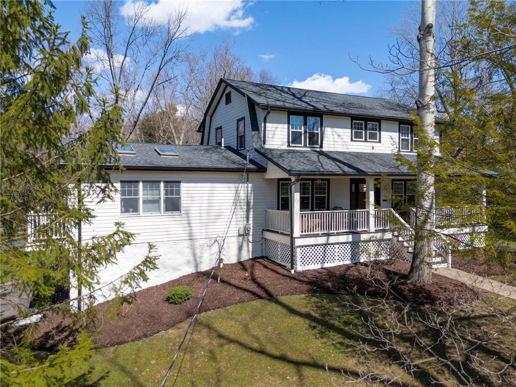 3252 Comanche Road Upper St. Clair, PA 15241 - Photo 45 of 50 a front view of a house with garden