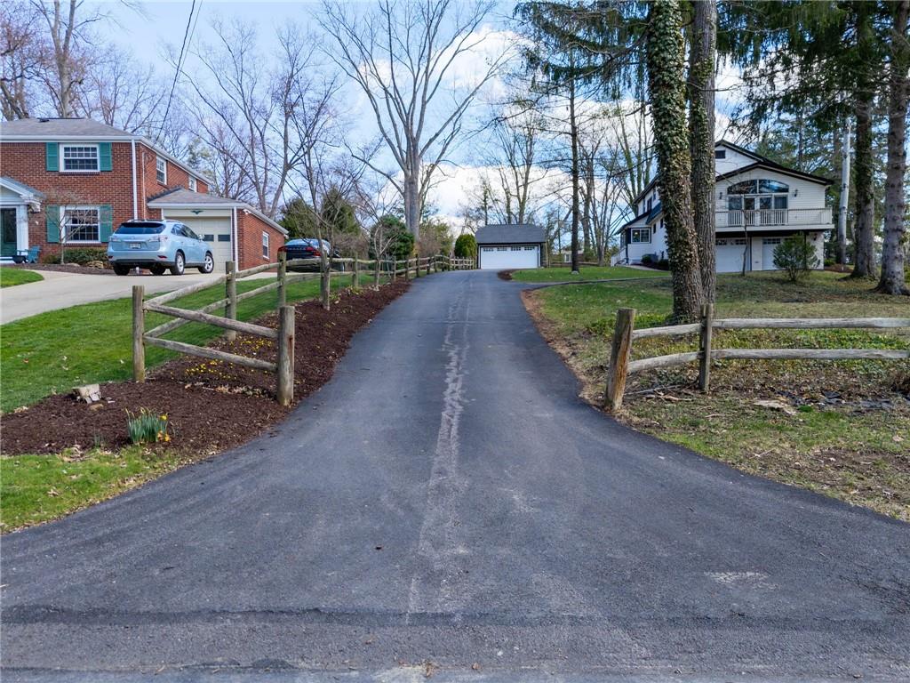 3252 Comanche Road Upper St. Clair, PA 15241 - Photo 47 of 50 a view of a street with brick building in front of it