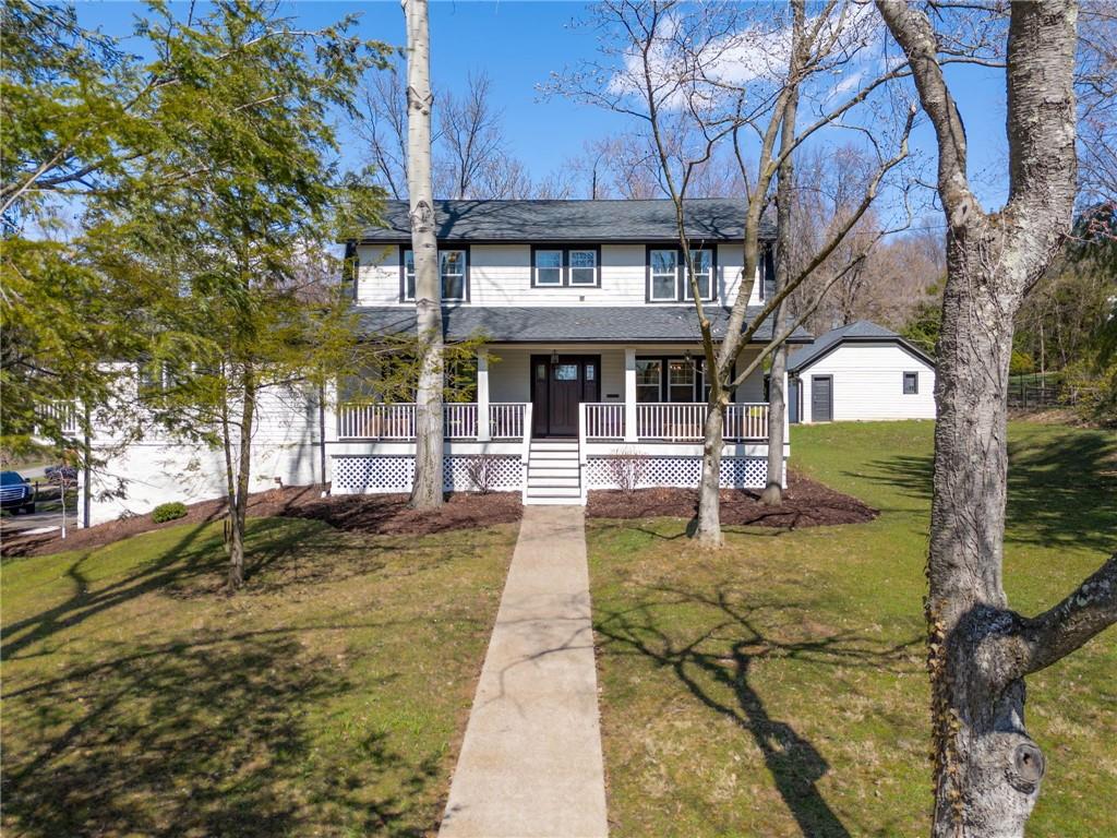 3252 Comanche Road Upper St. Clair, PA 15241 - Photo 50 of 50 a view of a house with large trees and a big yard