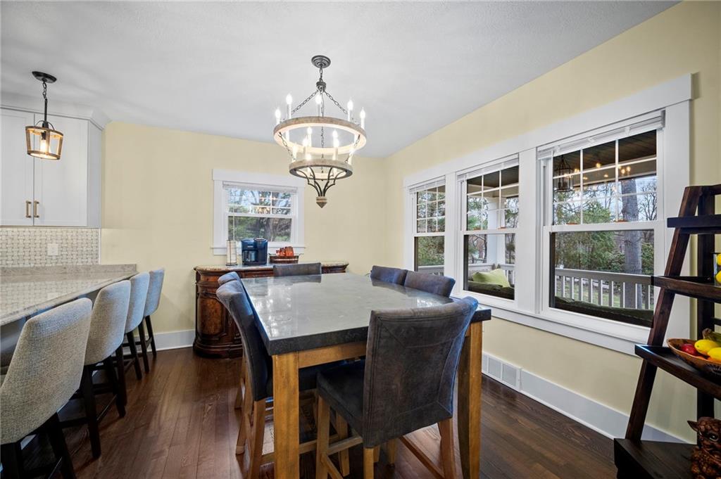 3252 Comanche Road Upper St. Clair, PA 15241 - Photo 7 of 50 a view of a dining room with furniture window and wooden floor