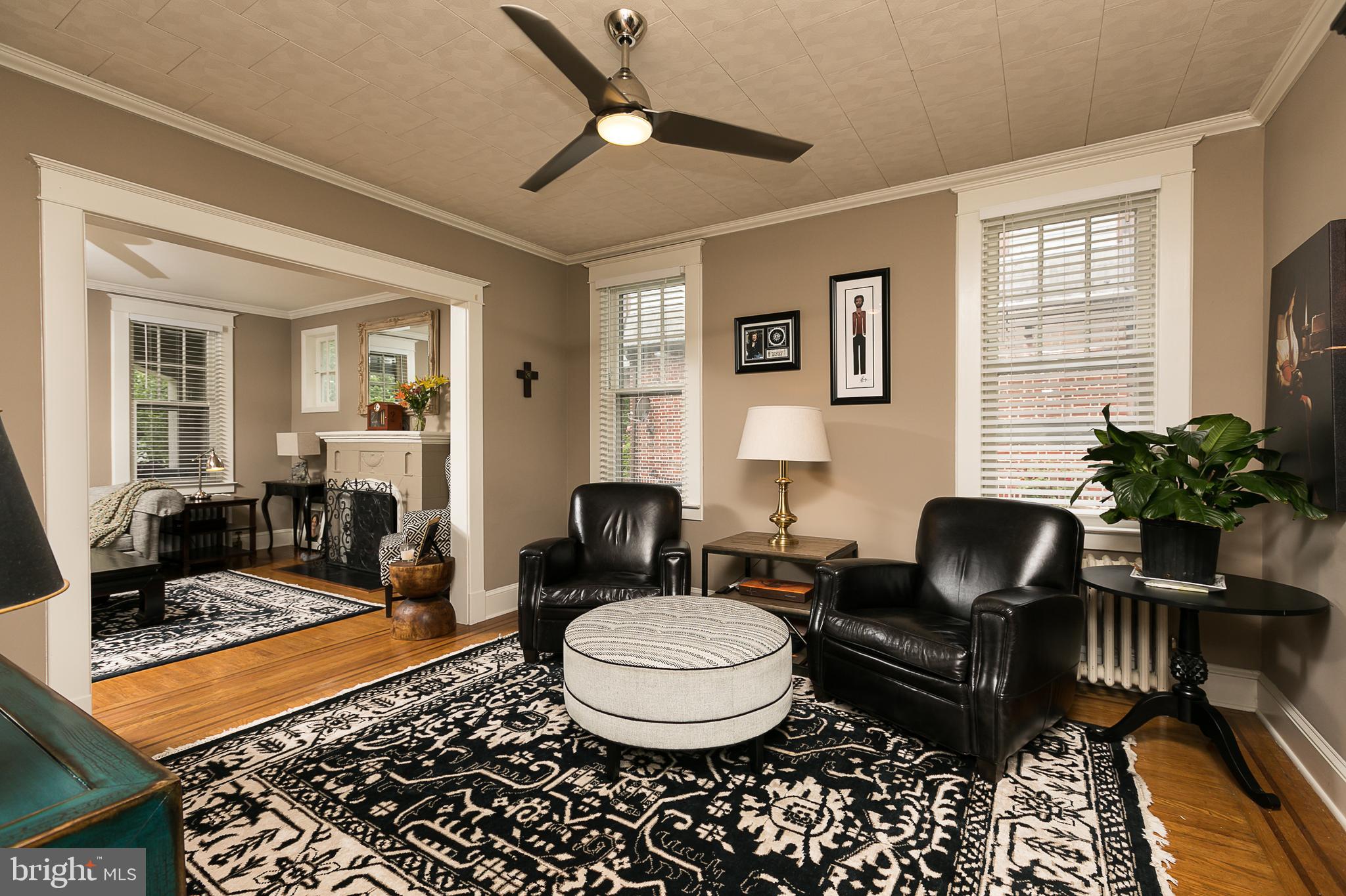 425 Westgate Road Baltimore, MD 21229 - Photo 12 of 32 a living room with furniture and a rug
