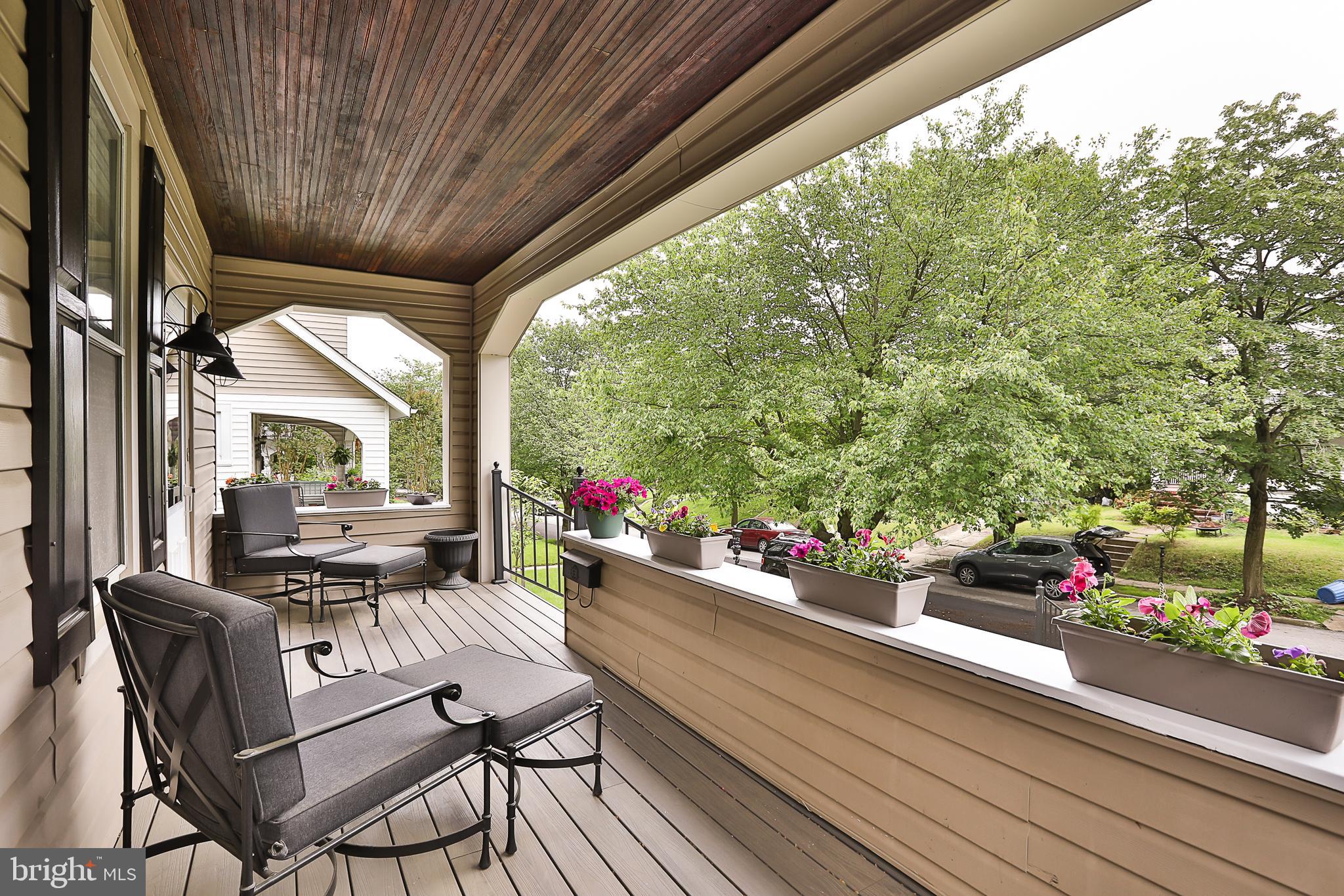 425 Westgate Road Baltimore, MD 21229 - Photo 4 of 32 a view of a porch with furniture