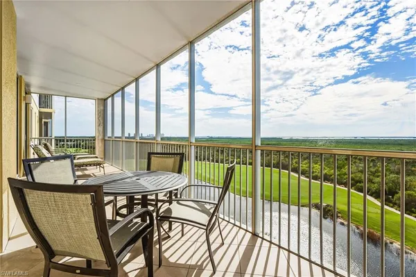 a view of a balcony dining area