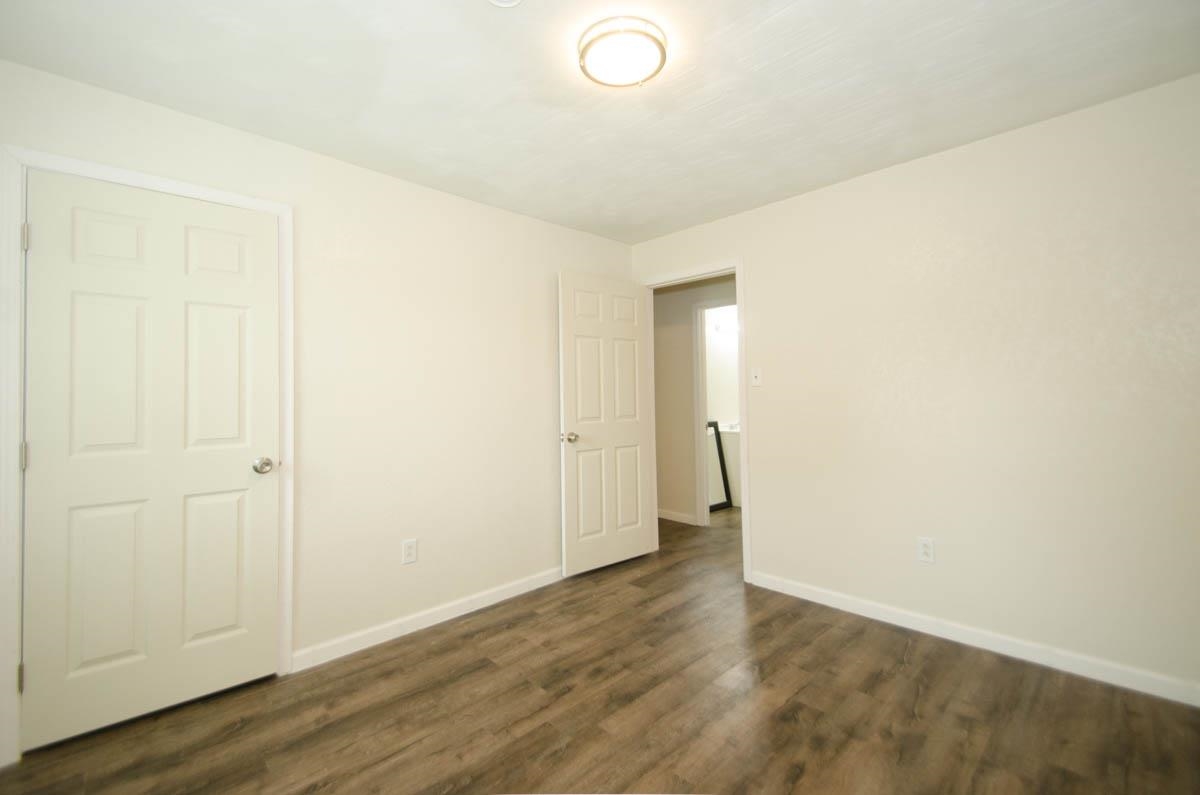 35 Dee Road Somerville, TN 38068 - Photo 8 of 15 Unfurnished room with dark wood finished floors and baseboards