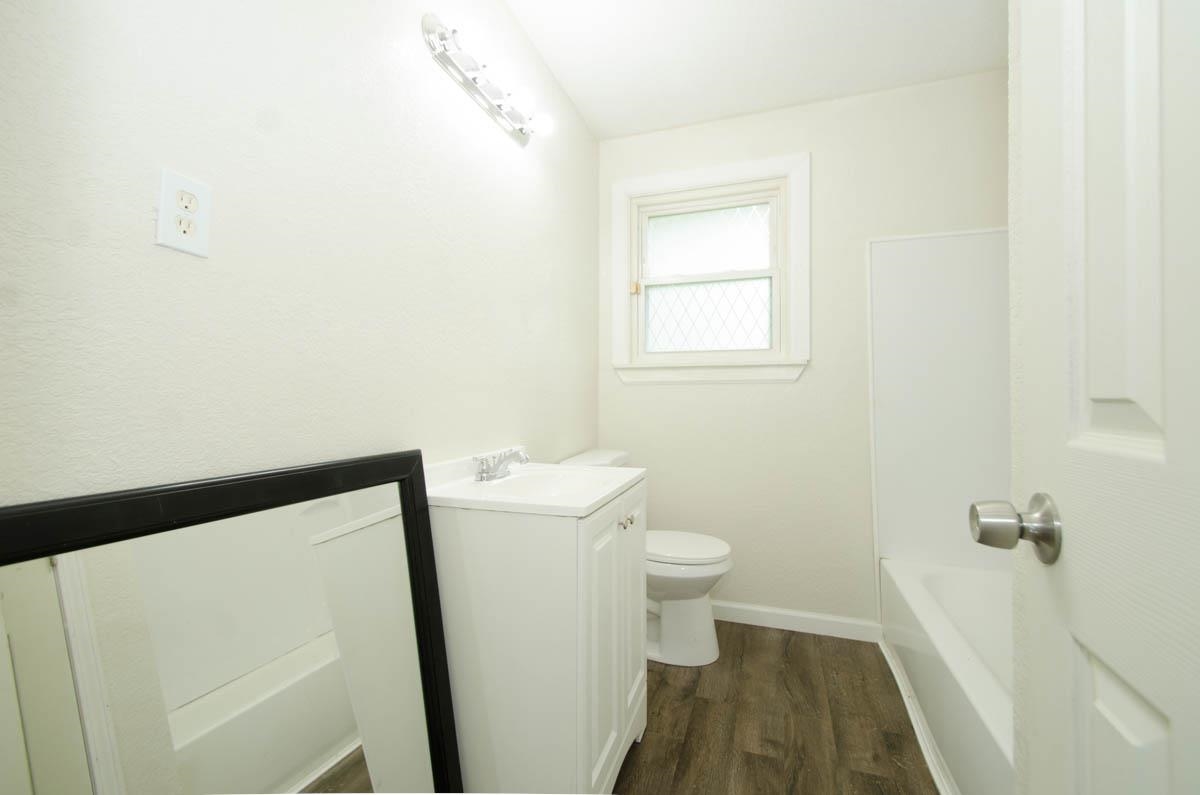 35 Dee Road Somerville, TN 38068 - Photo 9 of 15 Bathroom with vanity and wood finished floors