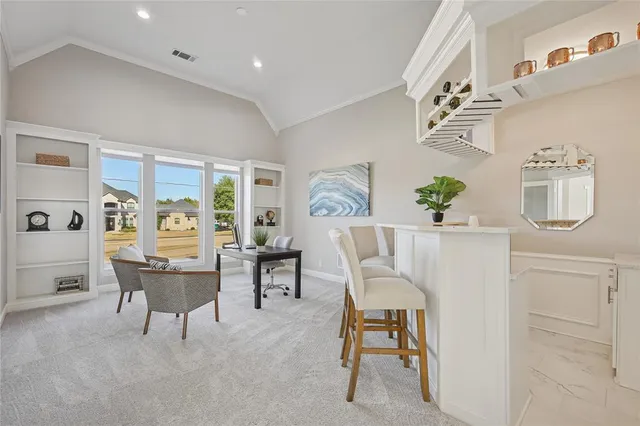 a living room with furniture and a table