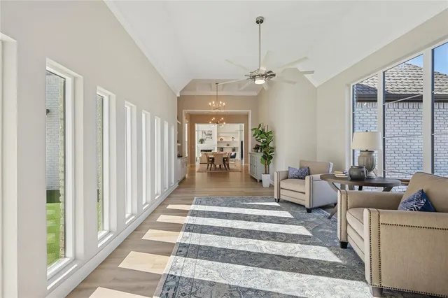 a view of a living room and a chandelier