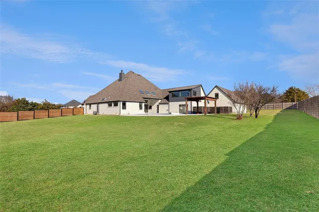 a view of a house with a swimming pool
