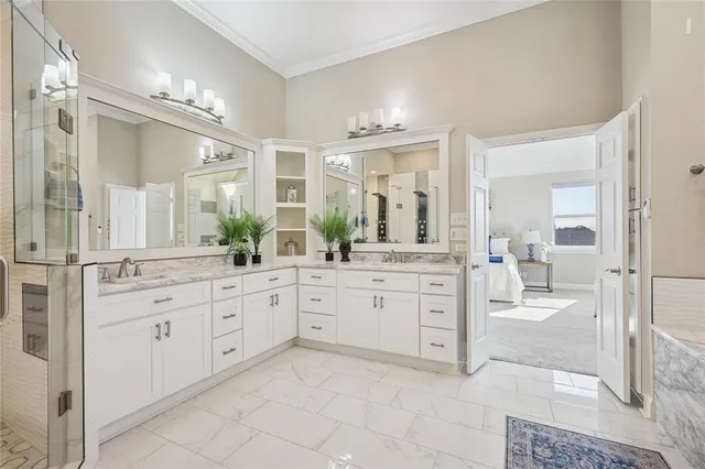 a bathroom with a granite countertop sink mirror and a