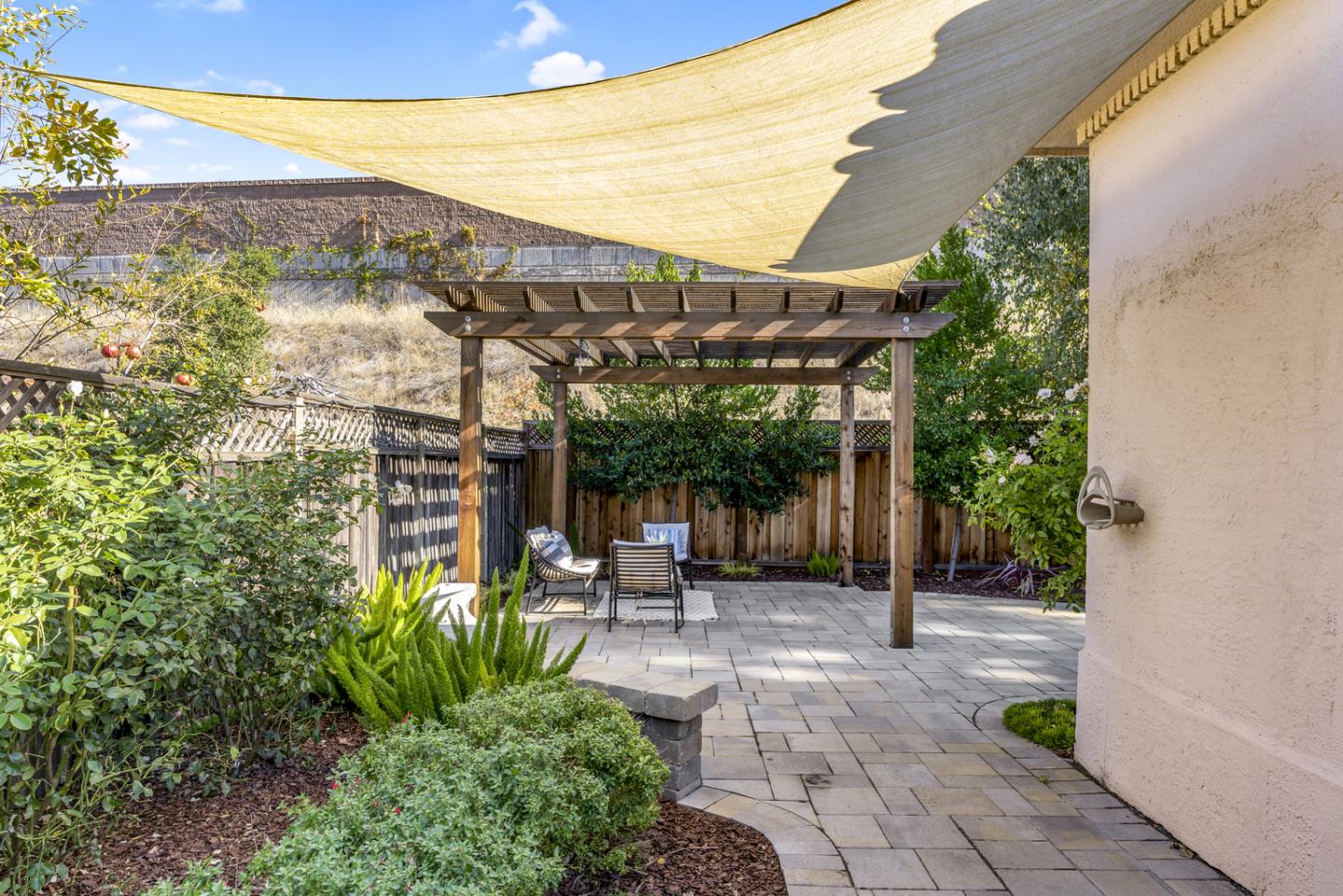 445 Northern Road San Jose, CA 95125 - Photo 13 of 42 a view of a patio with table and chairs and potted plants