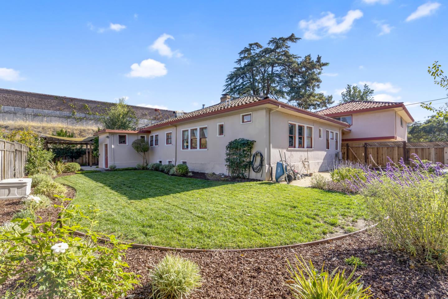 445 Northern Road San Jose, CA 95125 - Photo 14 of 42 a view of a house with a backyard and porch