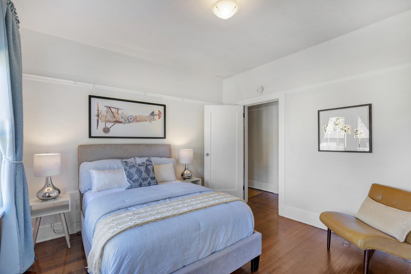 445 Northern Road San Jose, CA 95125 - Photo 23 of 42 a bedroom with a bed and a chair