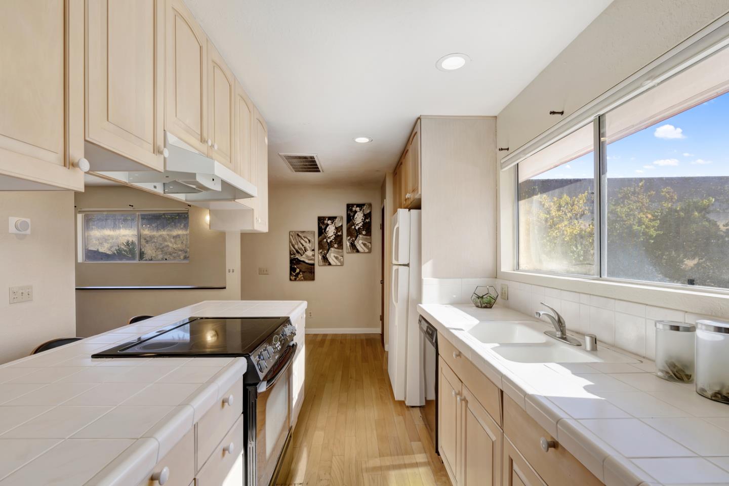 445 Northern Road San Jose, CA 95125 - Photo 31 of 42 a kitchen with a sink stove and refrigerator