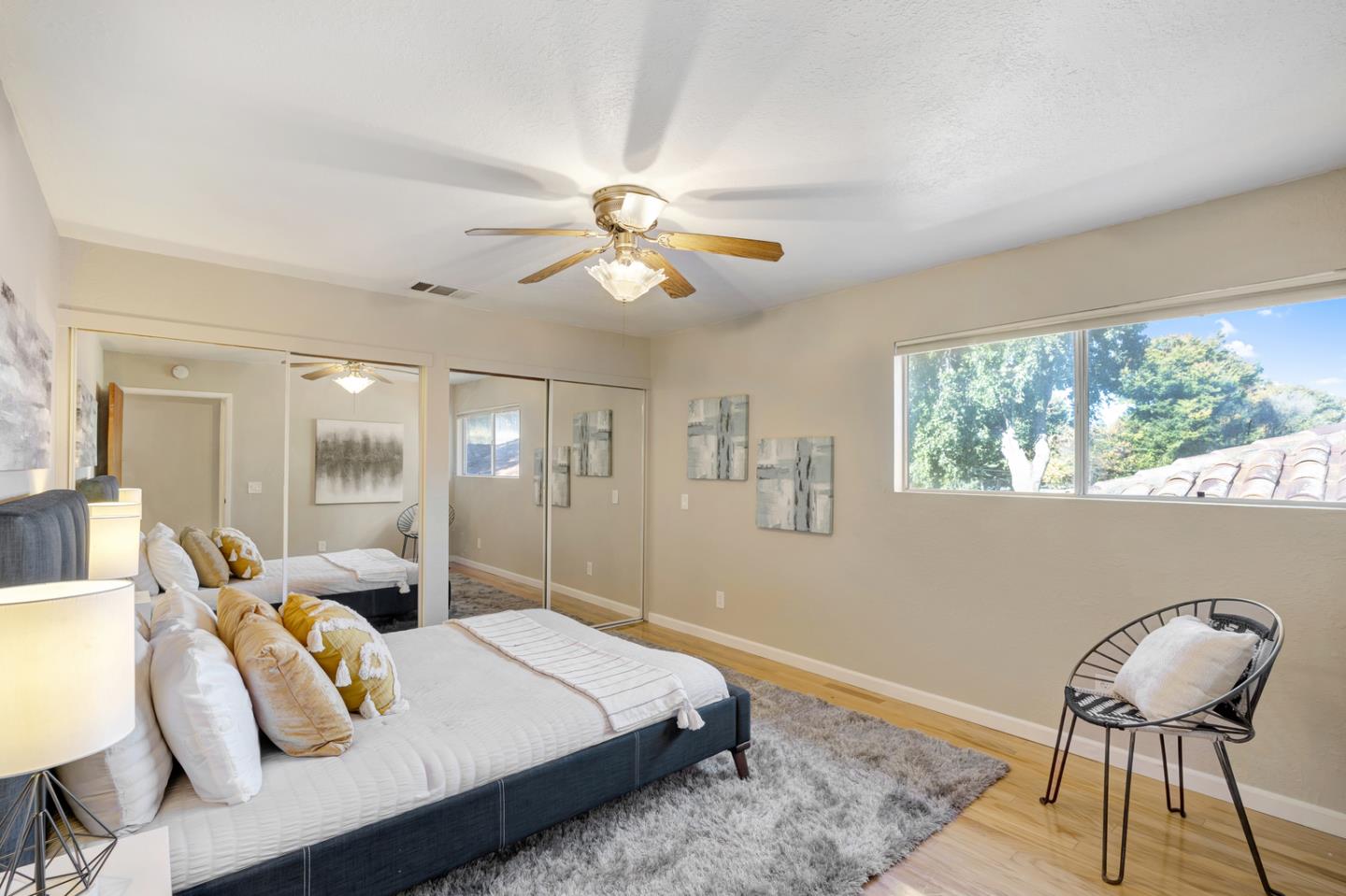 445 Northern Road San Jose, CA 95125 - Photo 35 of 42 a bedroom with a bed and a chandelier