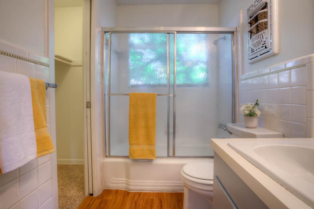 302 East 34th Street, Unit 103 Austin, TX 78705 - Photo 5 of 6 a bathroom with a sink and a toilet