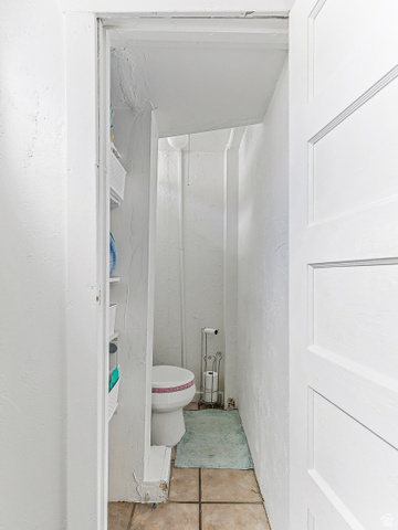 232 300 North Provo, UT 84606 - Photo 21 of 27 Bathroom with tile patterned flooring and a textured wall