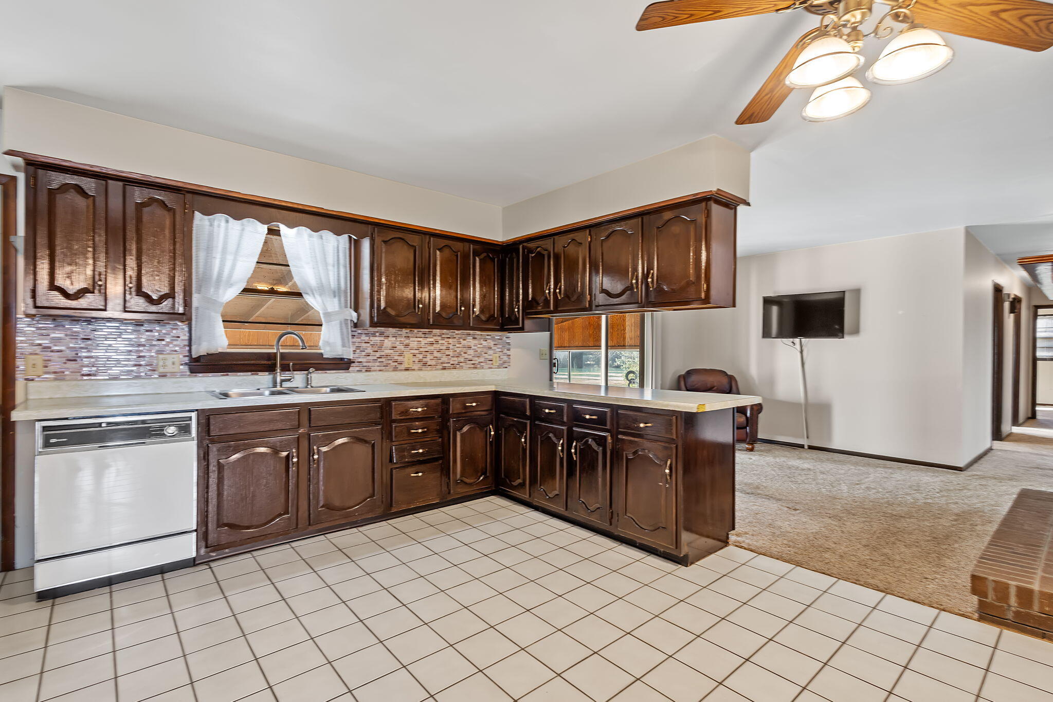 6801 West 1350th Street North Demotte, IN 46310 - Photo 13 of 44 a kitchen with stainless steel appliances granite countertop a sink and cabinets
