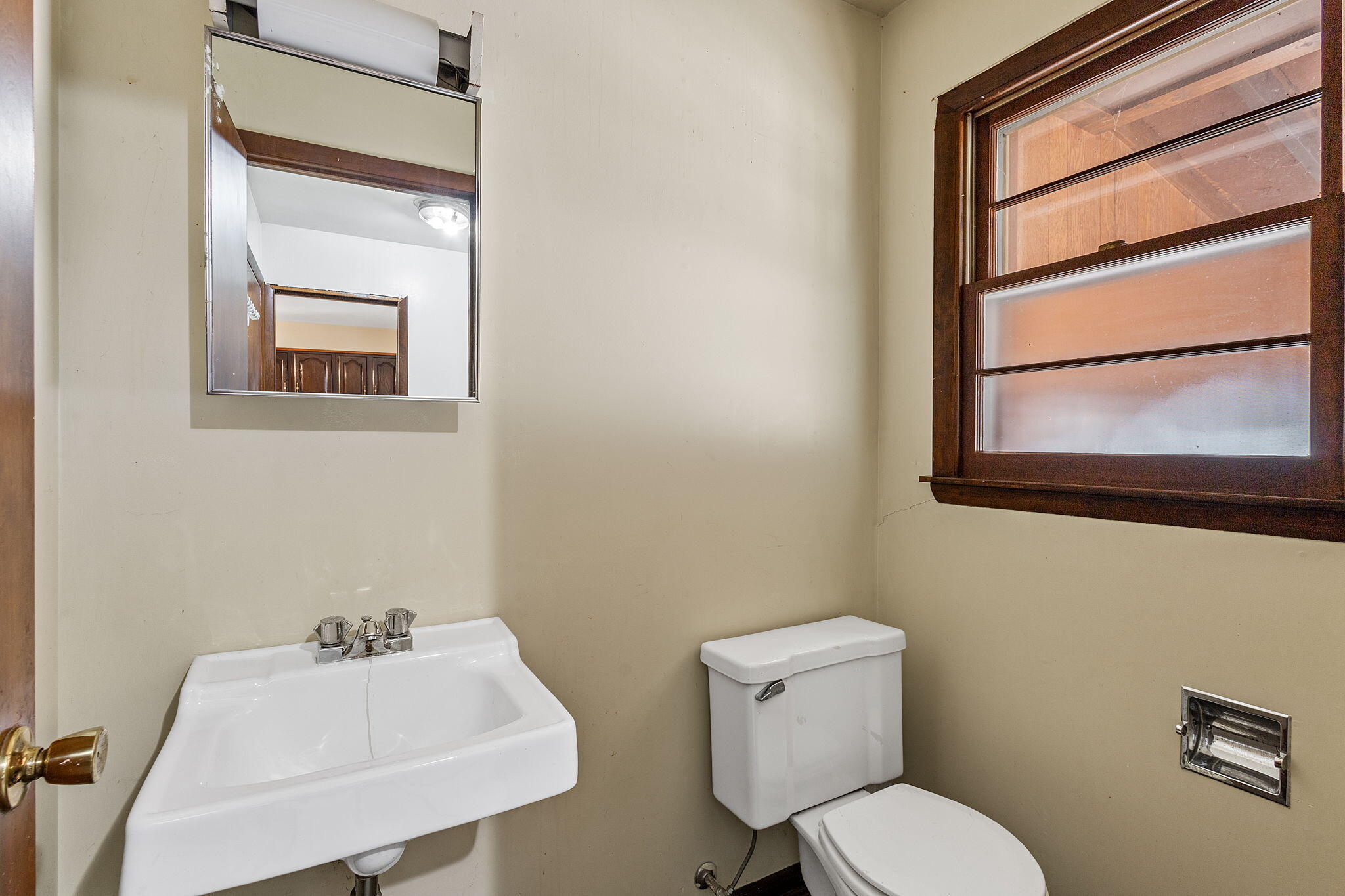 6801 West 1350th Street North Demotte, IN 46310 - Photo 26 of 44 a bathroom with a toilet sink and mirror