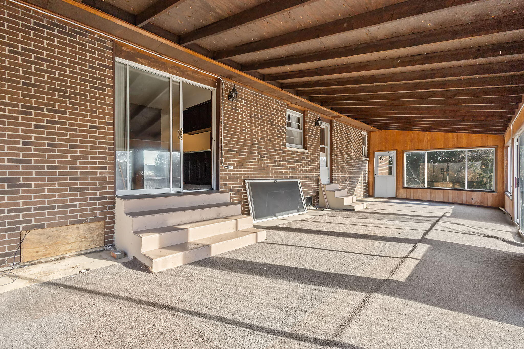 6801 West 1350th Street North Demotte, IN 46310 - Photo 28 of 44 a view of a building with a bench