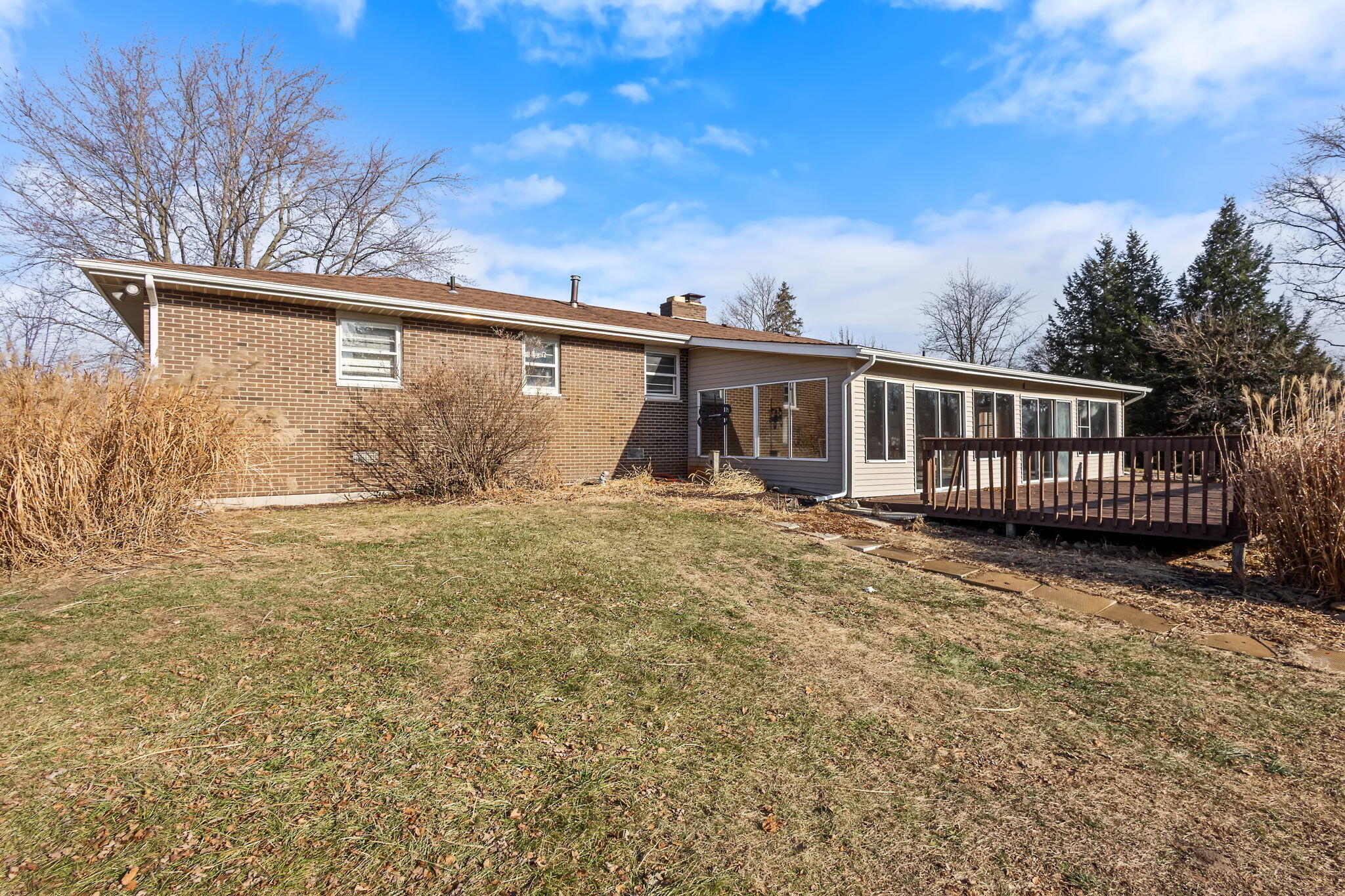 6801 West 1350th Street North Demotte, IN 46310 - Photo 37 of 44 a front view of a house with garden