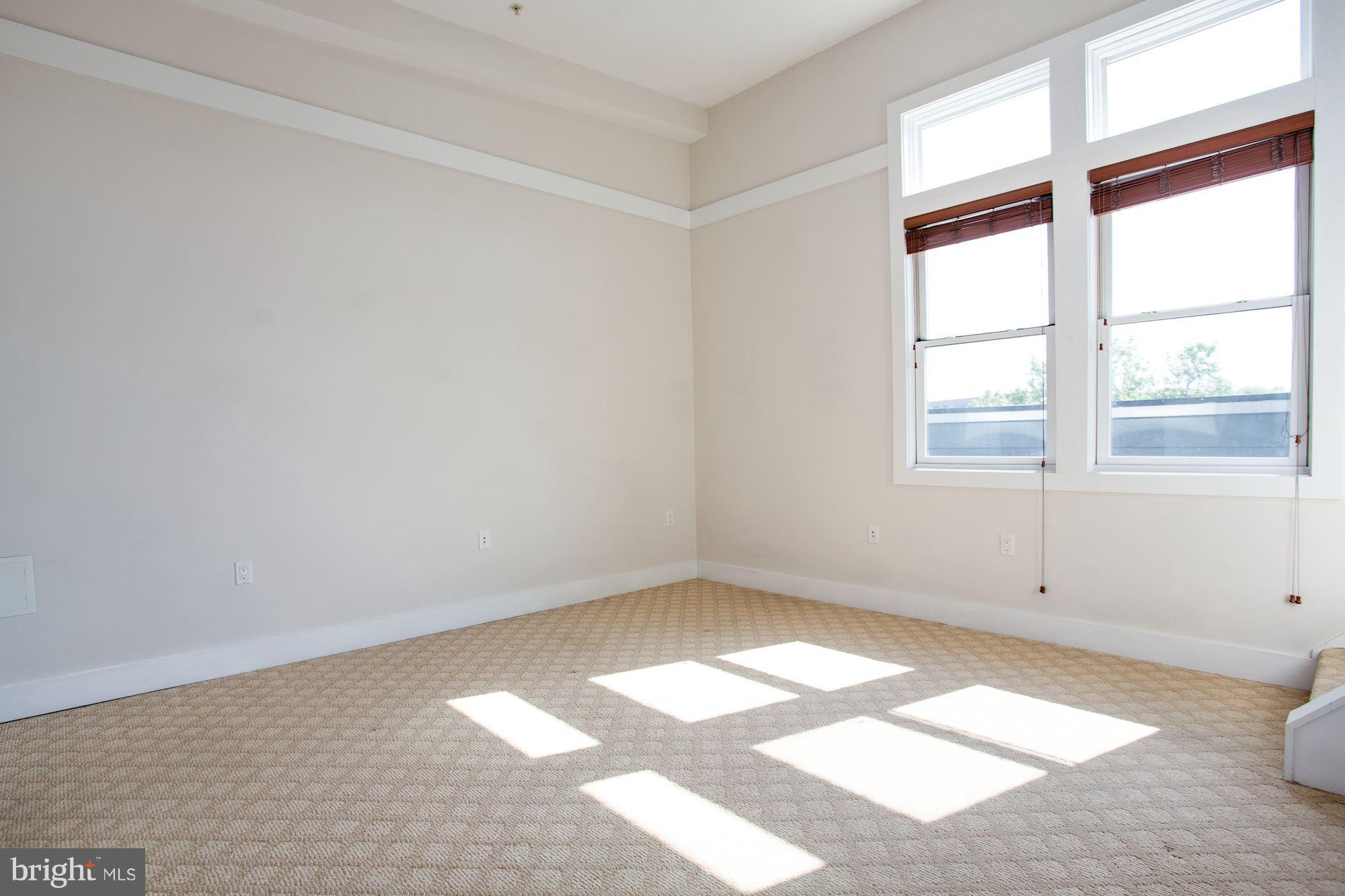 1912 4th Street Northeast, Unit 2 Washington, DC 20002 - Photo 11 of 23 an empty room with a window