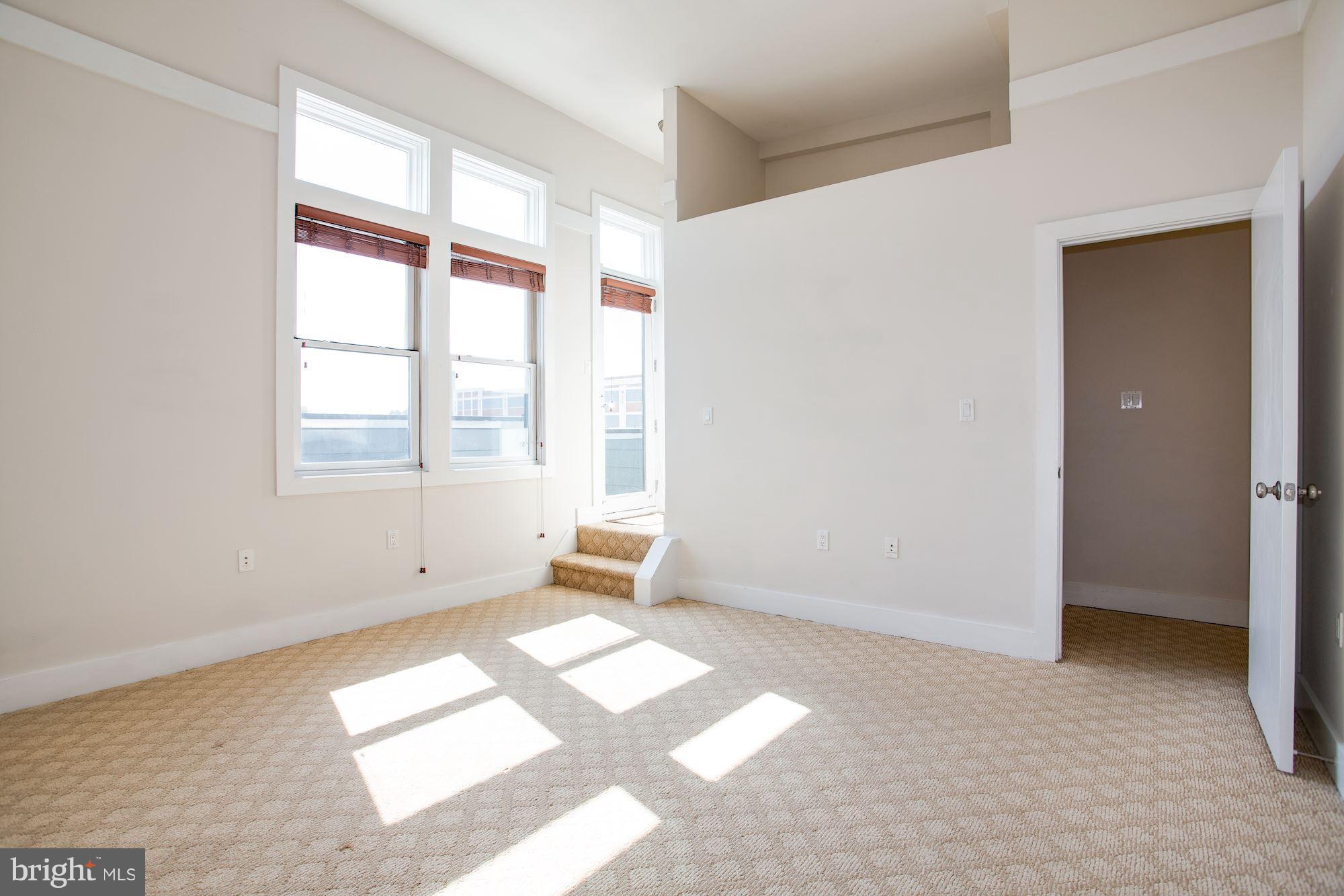 1912 4th Street Northeast, Unit 2 Washington, DC 20002 - Photo 13 of 23 a view of an empty room with a window