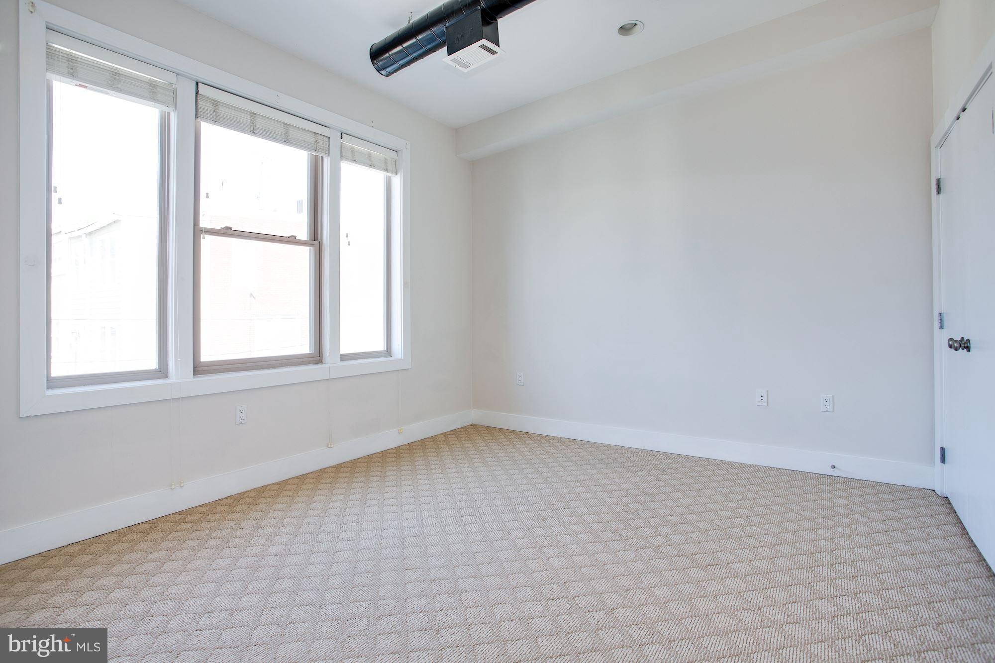 1912 4th Street Northeast, Unit 2 Washington, DC 20002 - Photo 17 of 23 an empty room with a window