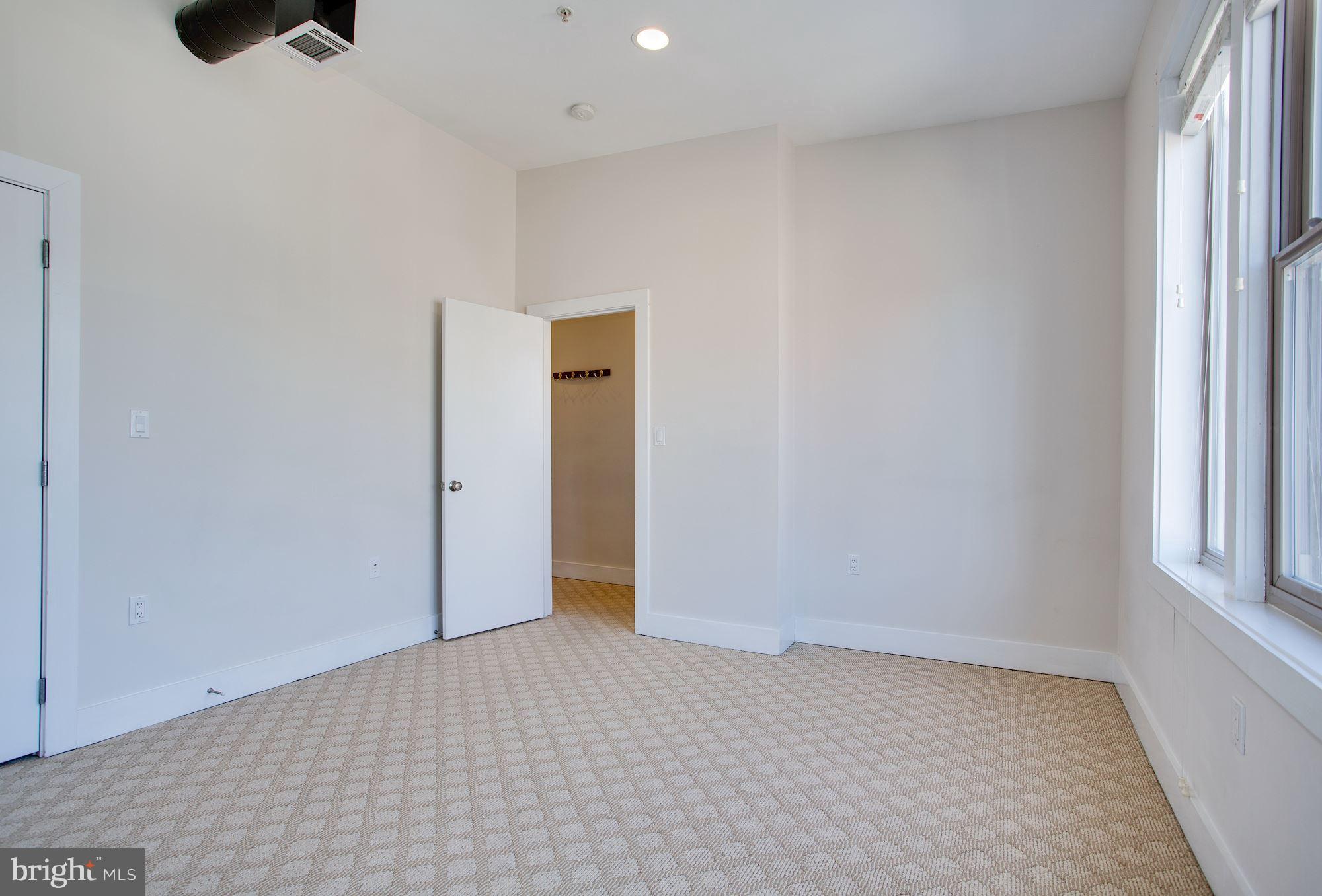 1912 4th Street Northeast, Unit 2 Washington, DC 20002 - Photo 18 of 23 a view of an empty room