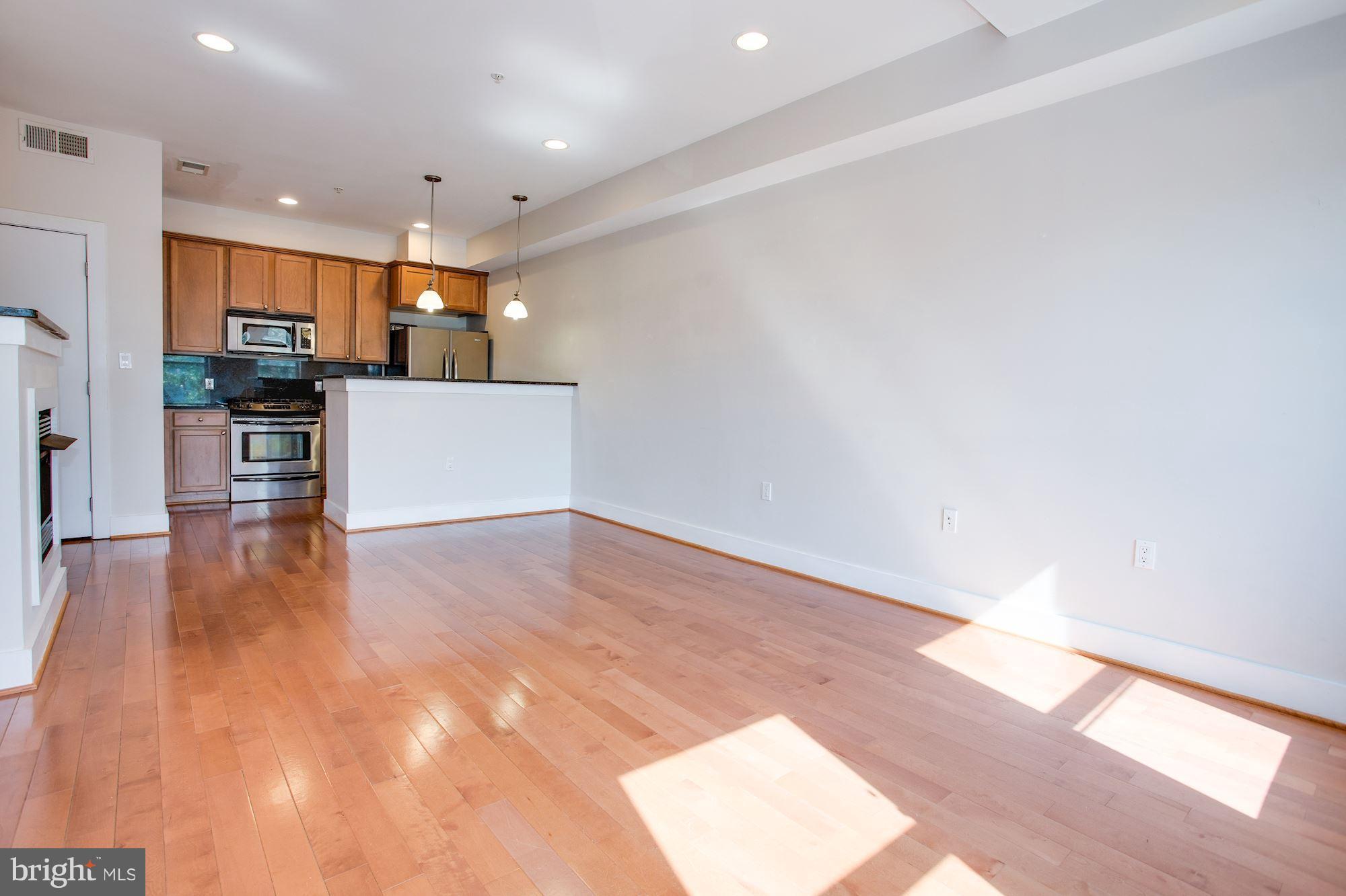 1912 4th Street Northeast, Unit 2 Washington, DC 20002 - Photo 6 of 23 a view of kitchen with wooden floor