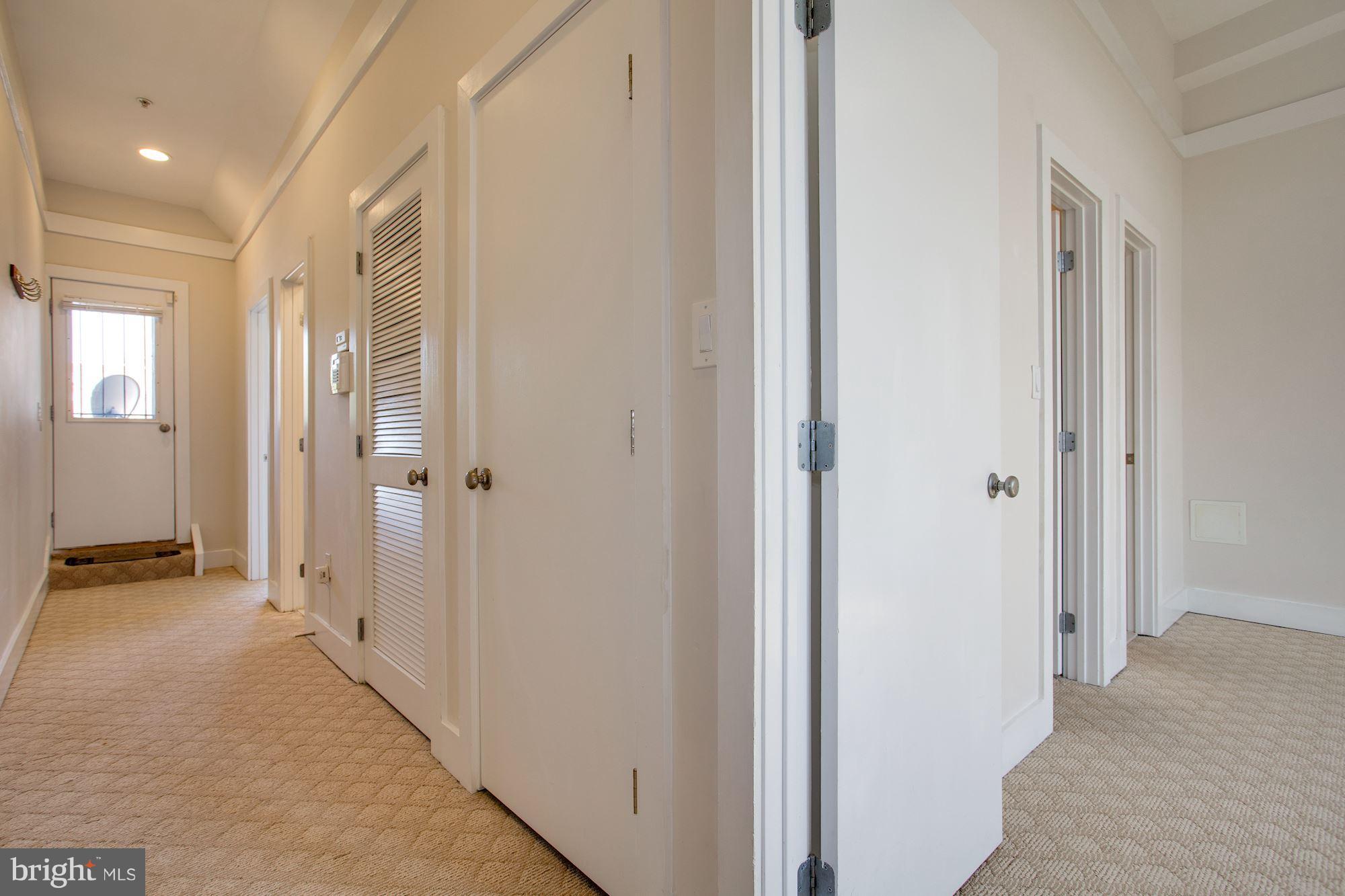 1912 4th Street Northeast, Unit 2 Washington, DC 20002 - Photo 10 of 23 a view of a hallway with closet and bathroom