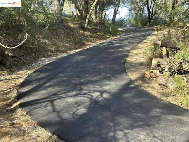 a view of a yard with a sink