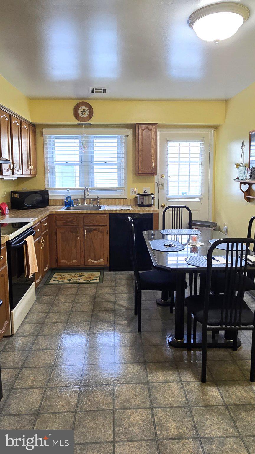Sunny kitchen with warm wood accents.
