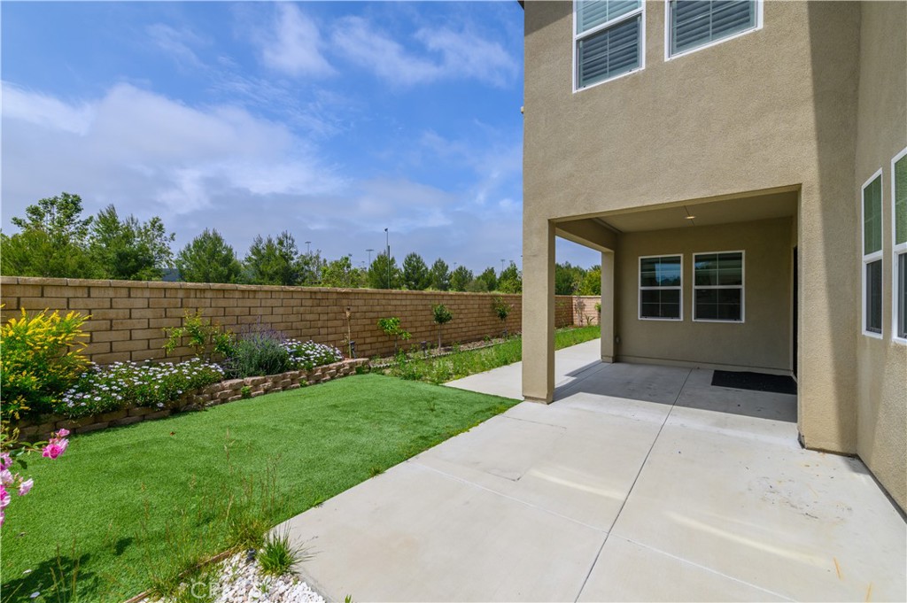 105 Bryce Run Lake Forest, CA 92630 - Photo 34 of 36 front view of a house with a yard