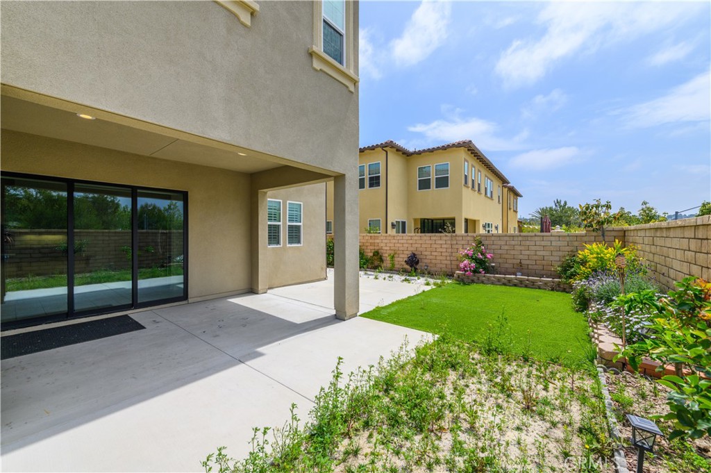 105 Bryce Run Lake Forest, CA 92630 - Photo 36 of 36 a front view of house with yard and green space